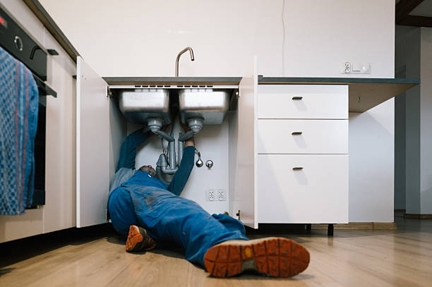 Professional Drain Cleaning technician working in Troy, NY
